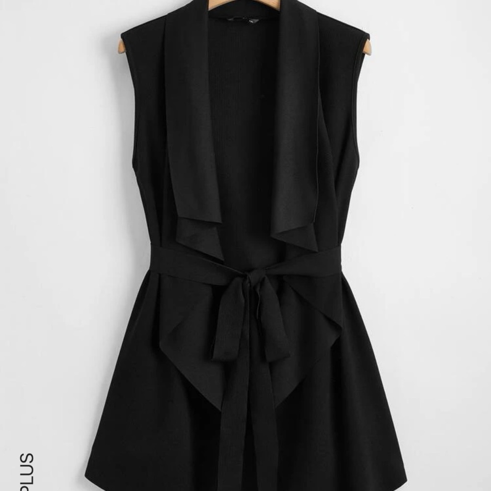 Black belted vest